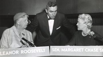 Senator Margaret Chase Smith and First Lady Eleanor Roosevelt talking to a CBS employee on the set of Face the Nation in November, 1956.