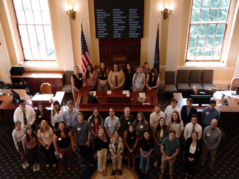 Maine Government Summer Internship Students standing on the floor of the Maine State Senate at the State House.
