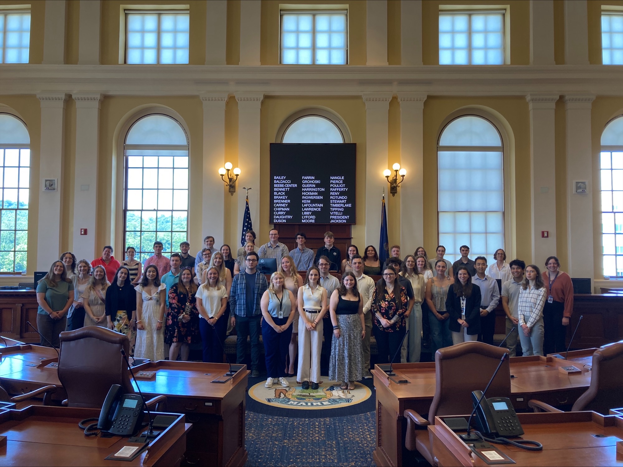 2024 Maine Government Internship Progran interns in the Senate chamber of the State House.