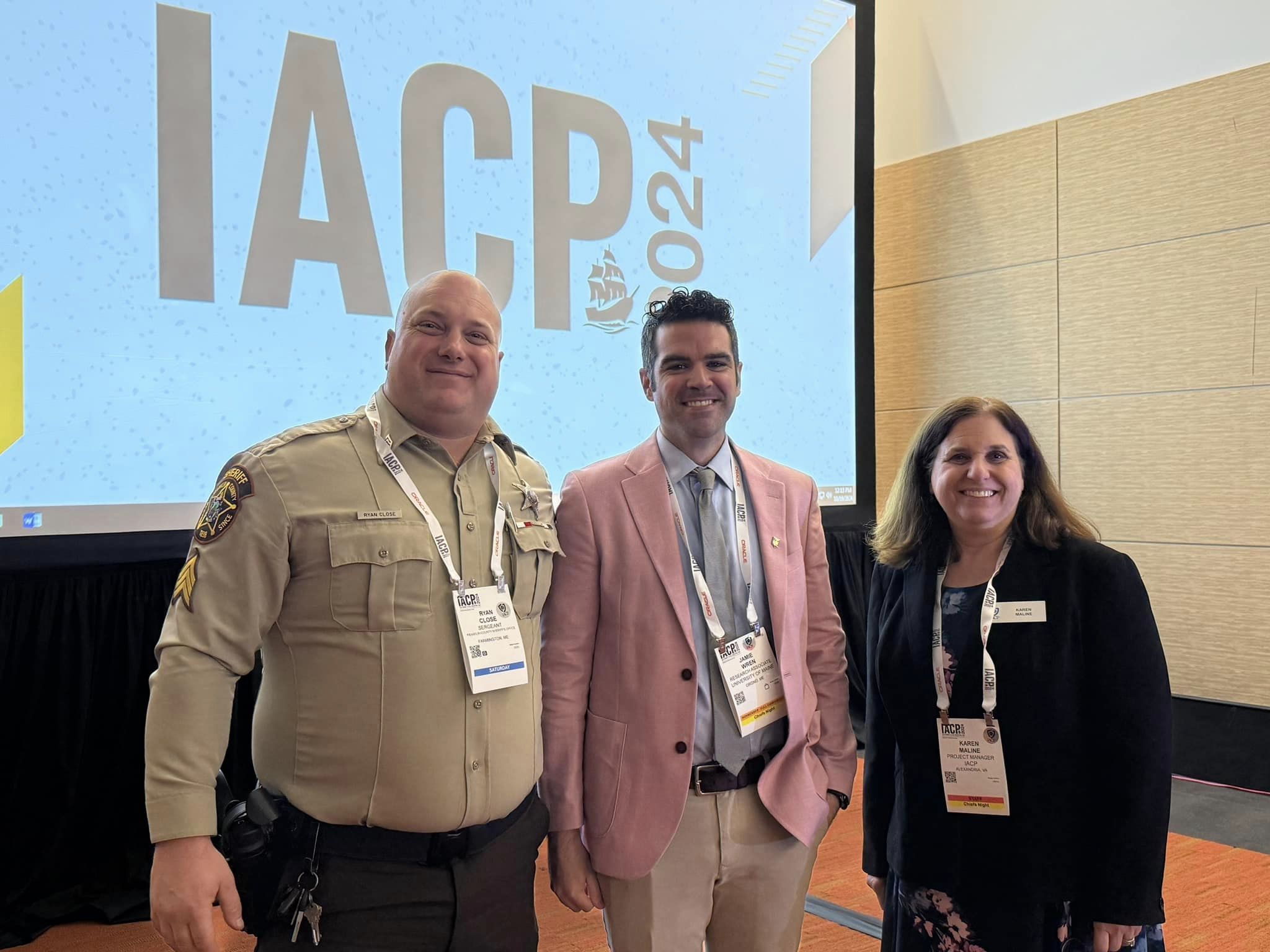 Jamie Wren (middle) with Ryan Close (left) and Karen Maline (right) at IACP 2024.